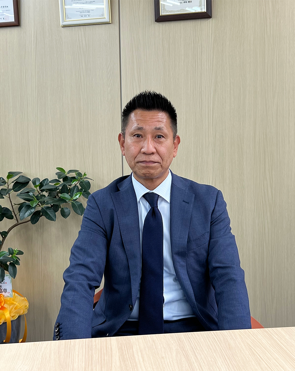 谷口　利一